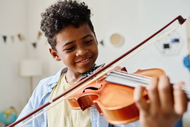 Student practicing violin – violin lessons in St. Catharines and Niagara Region